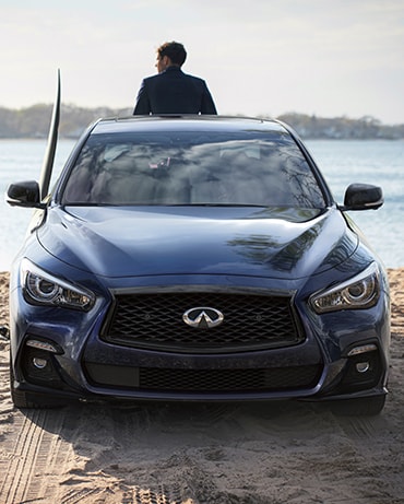 Front profile view of 2024 INFINITI Q50 Luxury Sedan highlighting front bumper and grille