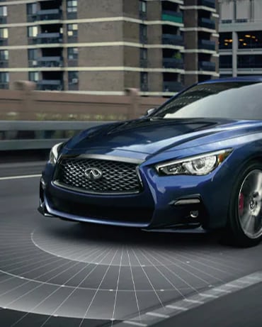 Front profile of 2024 INFINITI Q50 Luxury Sedan highlighting driver assistance feature