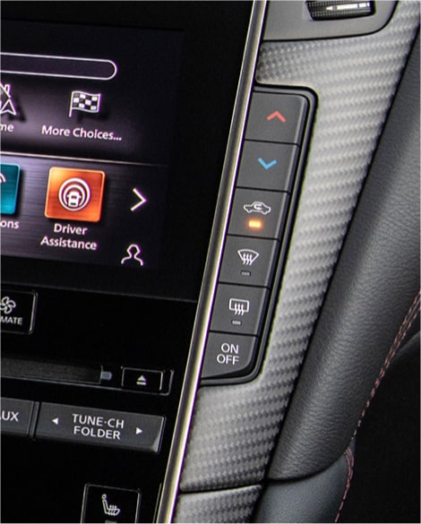 Interior close up of the 2024 INFINITI Q50's climate control system
